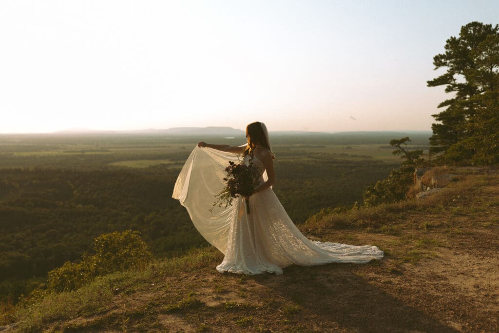 Real destination elopement moments photographed with documentary approach at St. Petit Jean State Park in Arkansas by Alanie Sayer Photography